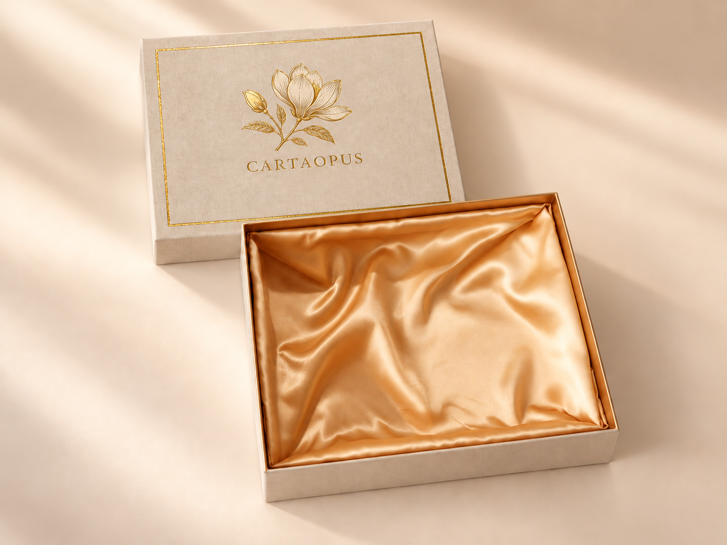 Textured rigid box shown open with a gold-toned lined interior.